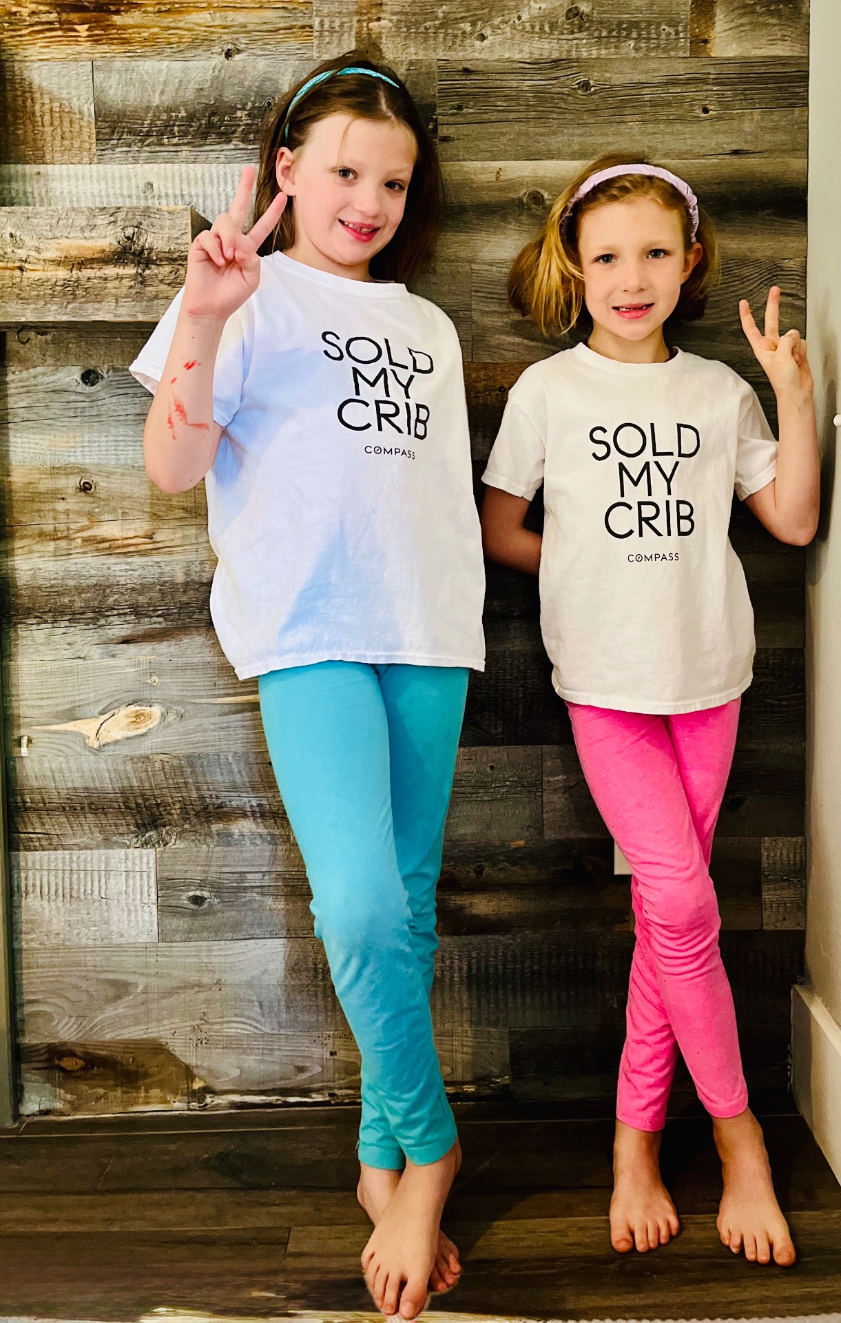 Cessna's twin daughters wearing 'Sold My Crib' t-shirts — the real-life inspiration behind the TwinTC™ name